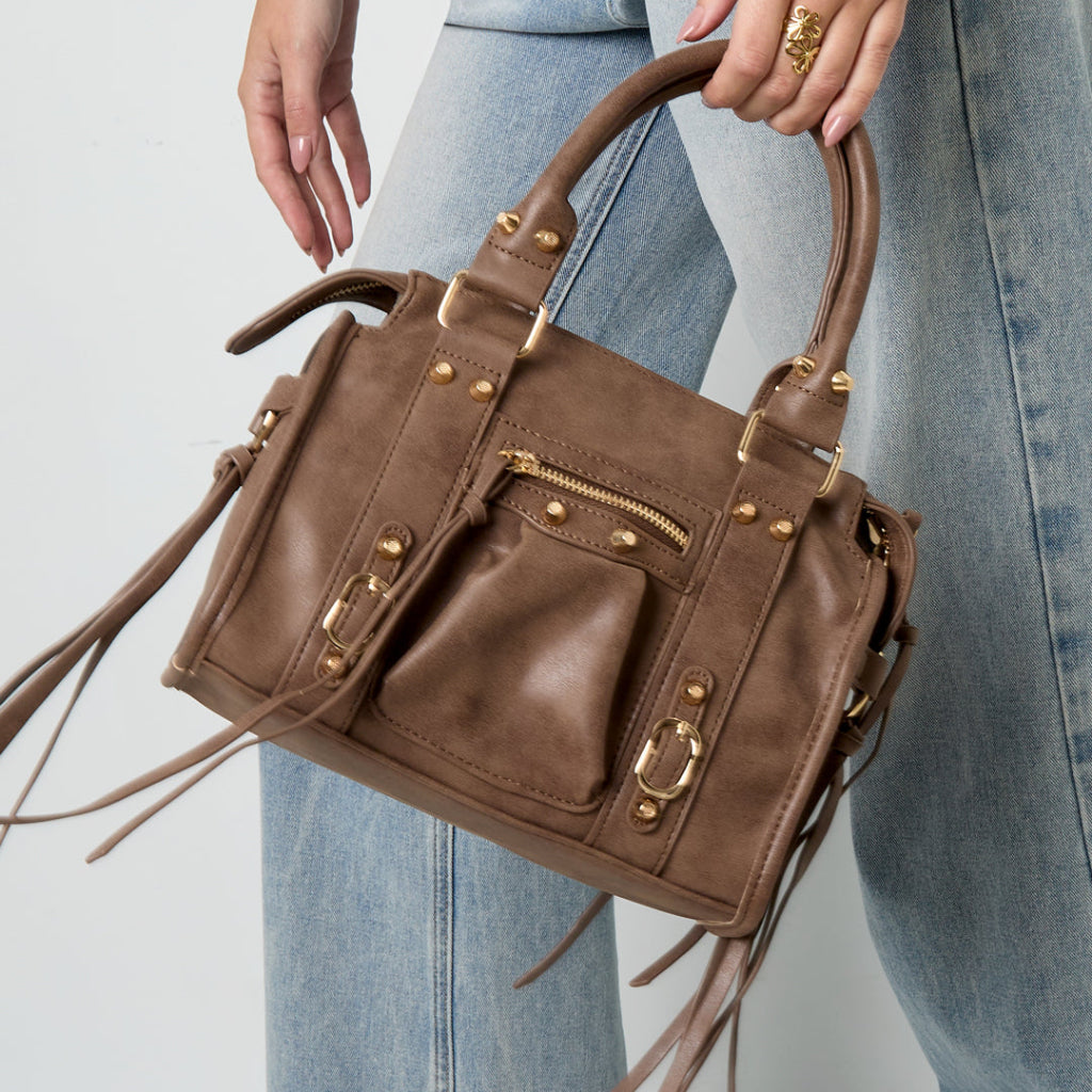 Franjehandtas met accentdetails