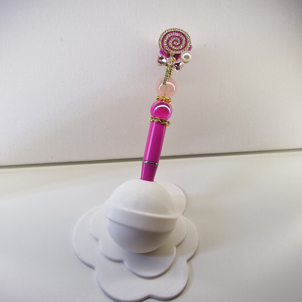 Handversierde roze pen met fuchsiaroze lolly topper